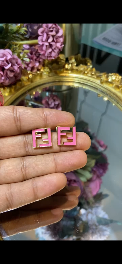 F pink earrings